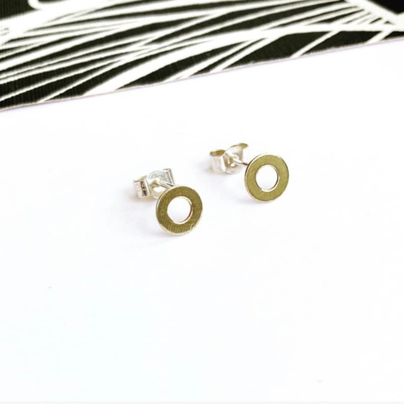 Tiny brass circle studs