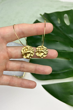 24k Gold Plated Big Hammered Brass Hoops featuring textured domed discs suspended from delicate wire hooks, showcased against tropical monstera leaves. 35mm statement earrings with unique hammered texture and brilliant golden finish - Aloe Earrings Collection: Jewellery, Gifts Under £15, Gifts under £20, Earrings, Face, Aloe Earrings