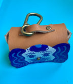 6049f0ff45e42d1cbc99c46b_blue-staffordshire-poo-bag-holder-2_1761138349242.jpg