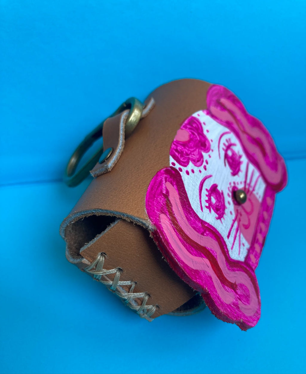 6049f0ff45e42d1cbc99c46b_pink-staffordshire-poo-bag-holder-3_1761138349246.jpg