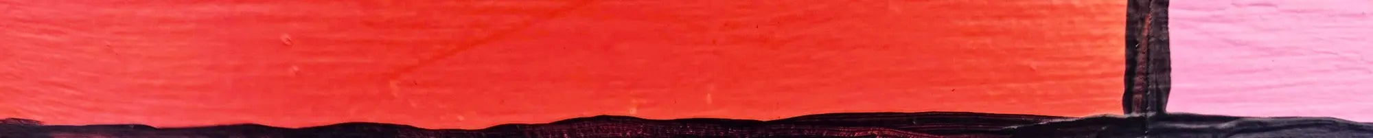 Close-up of the Neighbourhood Store entrance showing bold red and pink painted panels created by artist Chloe Batchelor