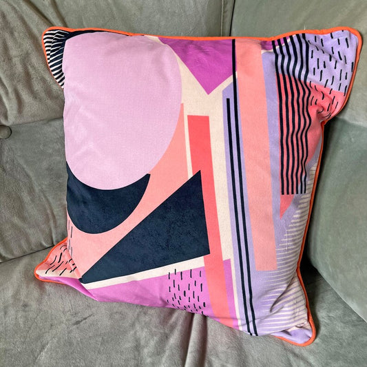 Geometric Pattern printed velvet cushion pinks/coral/lilac circle/black lines and stripes/cream