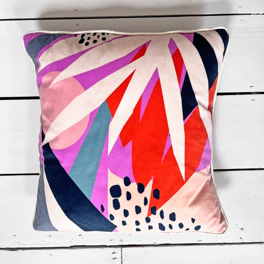 Geometric pattern printed velvet cushion Pink/Orange/grey/cream leaf and Navy spots