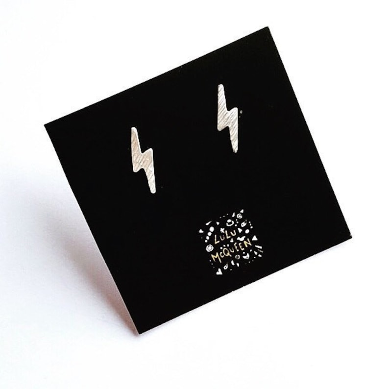 Silver lightning bolts studs earrings